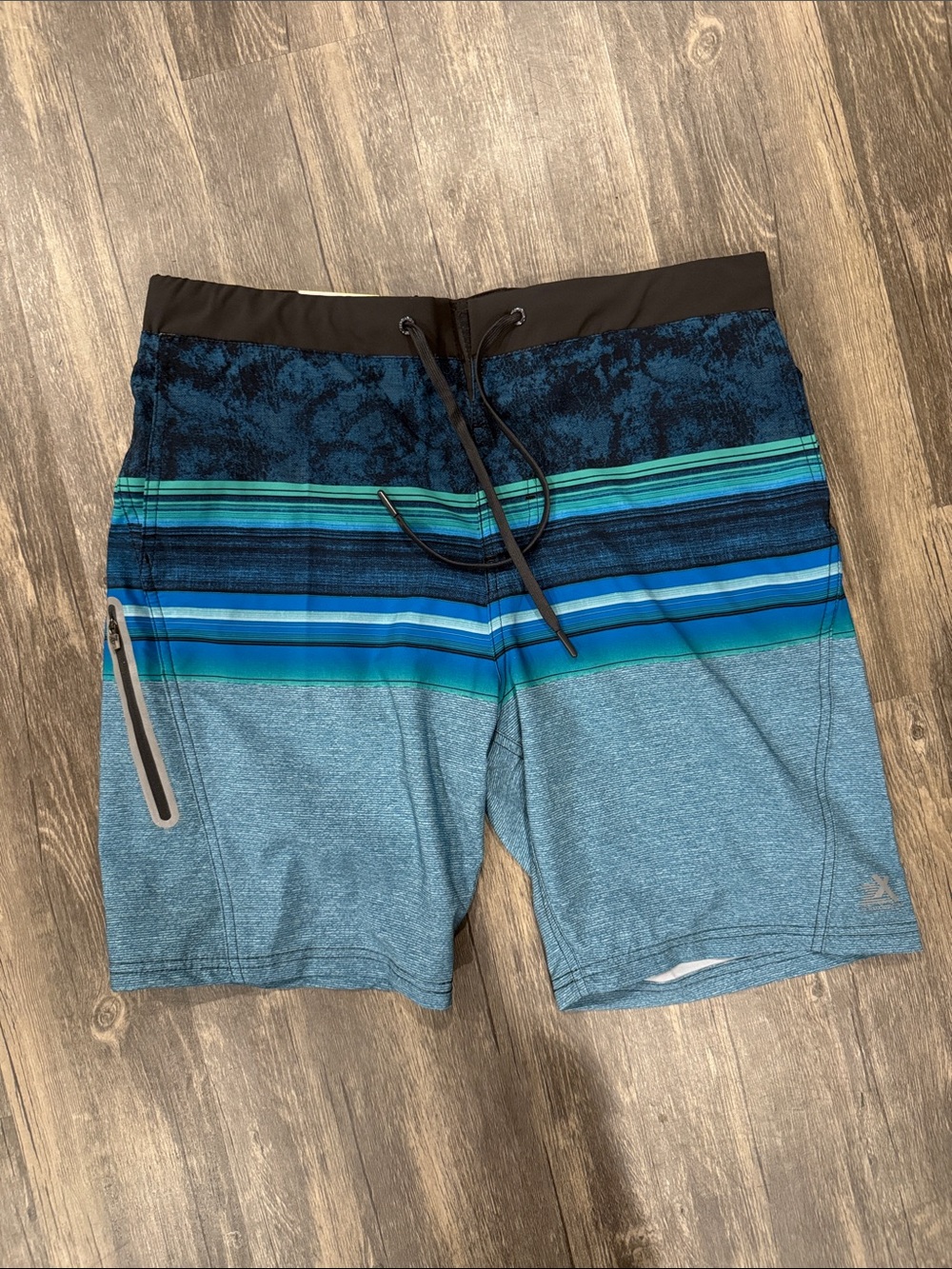 ZeroXposur Blue and Teal Striped Board Shorts style swim trunks